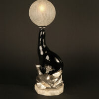 LAMPE VEILLEUSE OTARIE DE GEORGES BENOÎT, 1927, EN BRONZE, MARBRE ET VERRE MOULÉ-PRESSÉ CRAQUELÉ